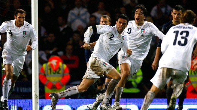 Italy break Scottish hearts to qualify