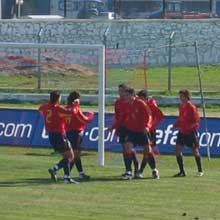 Carmona (centre) celebrates scoring Spain's second goal with his team-mates