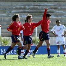 Carlos Carmona (right) accepts congratulations after scoring