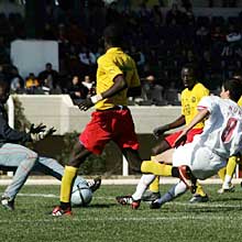 Nuri Sahin (right) threatens the Cameroon goal