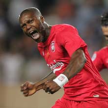 Djibril Cissé celebrates scoring Liverpool's equaliser, the first of his two goals